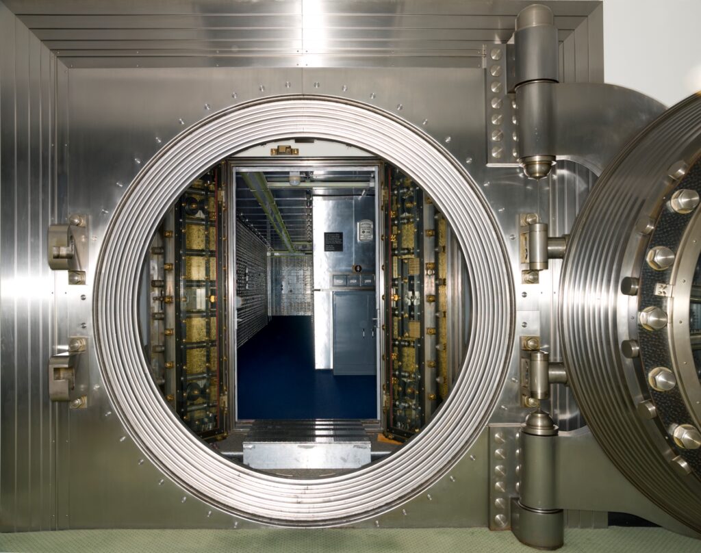 big vault door protecting precious metals