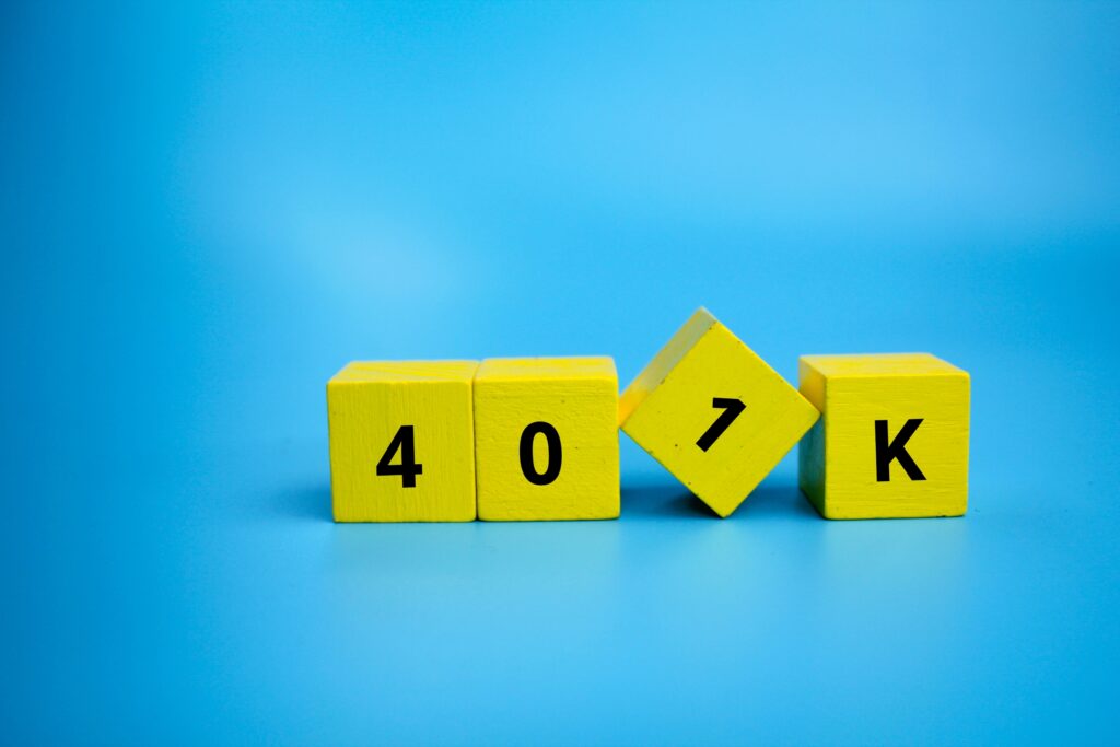 yellow cubes that say 401k with blue background